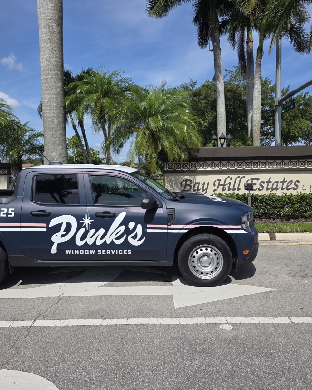 Pink's Window Services pickup at the Bay Hill Estates entrance