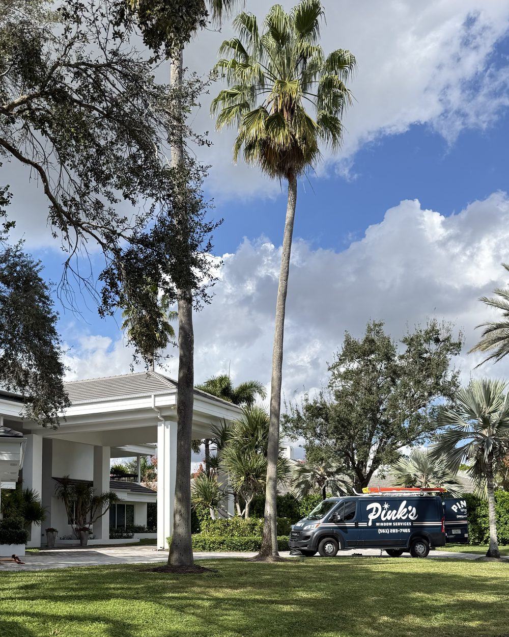 Pink's Window Services van at a Treasure Coast estate